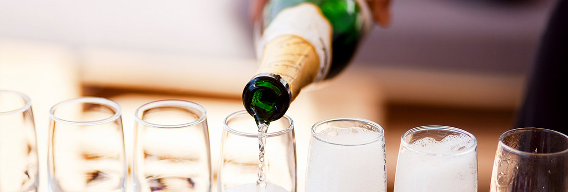 champagne pouring into glasses